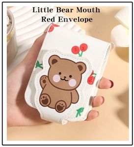 Handheld view of a cute cartoon bear lipstick pouch with textured PU leather and mirror