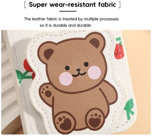 Close-up of durable Saffiano leather texture on cute cartoon bear lipstick case