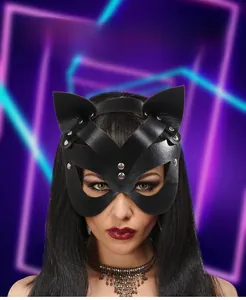 Detail of a black PU leather cat mask with silver rivets for cosplay parties