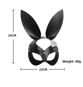 Detailed view of a black leather cat mask with metal rivets and size dimensions