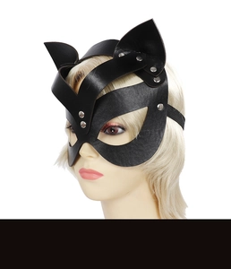 Detail of black leather cat mask with silver rivets and elastic strap on a mannequin