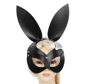 Detail of black faux leather bunny mask with long ears and silver metal rivets