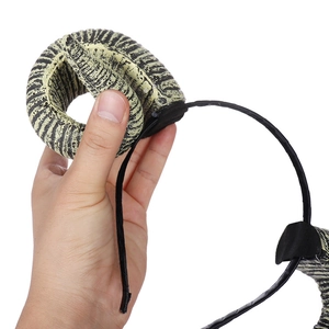 Detailed view of the textured spiral ram horns on a Halloween cosplay headband