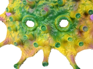 Close-up of fluorescent viral mask texture with tubular bumps and latex details