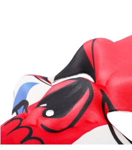 Close-up of red mesh Halloween mask showing detailed knit fabric and black eye design