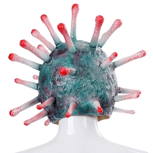 Dettaglio macro della maschera virale in lattice con punte rosse e trama biologica