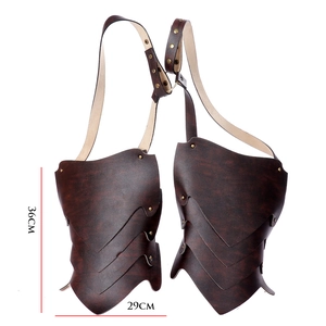 Detail of brown faux leather Viking pauldrons with metallic rivets and 36x29CM dimensions