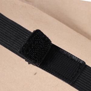 Detailed macro view of the black elastic velcro strap on the medieval viking armor