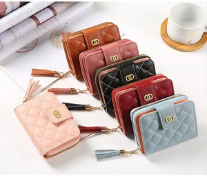 Quilted faux leather short wallets with tassels and gold rings in multiple colors