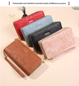 Group shot of floral embossed double zipper long wallets in five vibrant colors with straps
