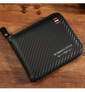 Detail of men's carbon fiber texture wallet with U-shaped zipper on dark wood