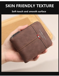 Detailed view of a men's short zip wallet in brown frosted texture with contrast stitching