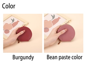 Détail de porte-monnaie ronds en cuir bordeaux et pâte de haricot avec zip doré