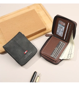 Macro detail of men's leather wallet interior showing card slots and zipper pocket
