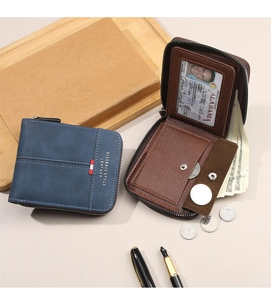 Detail of the internal card slots and snap button coin pocket in a men's faux leather wallet