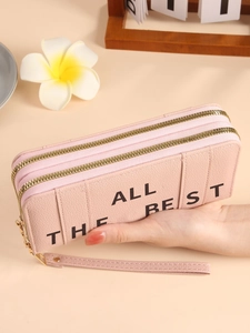 Pale pink lychee grain faux leather clutch bag with three zippers and wrist strap