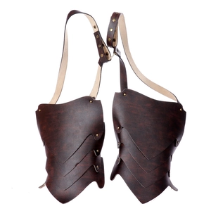 Medieval vintage leather shoulder armor with brown layered plates and gold rivets