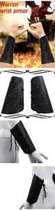Detail of black faux leather bracer with embossed texture and metal rivets for cosplay