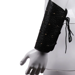 Punk gothic black leather arm guard with skull embossing and gold rivets