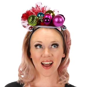 Christmas headband with colorful ornaments and red mesh on a female model