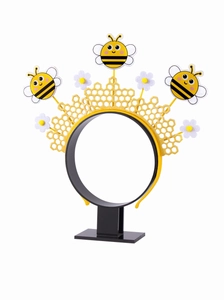 Détail d'un serre-tête ruche avec des abeilles mignonnes et des fleurs de marguerites