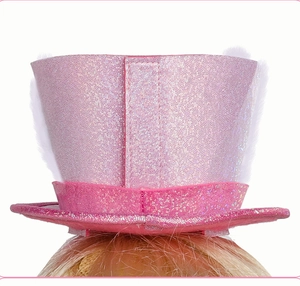 Close-up of pink glitter mini top hat hair accessory with feathers and velcro closure