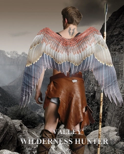 Detail of simulated feather wings with adjustable brown leather straps for cosplay