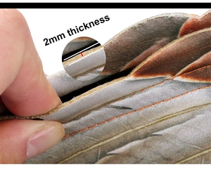 Macro shot showing 2mm thickness and durable stitching of the Mardi Gras angel wing fabric