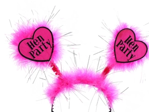 Detail of pink feather headband with Hen Party heart accents and silver tinsel