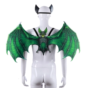 Detailed view of green bat wings and black ear headband set for Halloween cosplay
