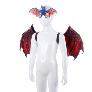 Detailed view of red and black bat wings and mask set on a mannequin for Halloween