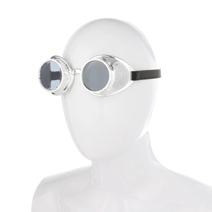 Detailed side view of silver steampunk goggles with dark lenses on a white mannequin