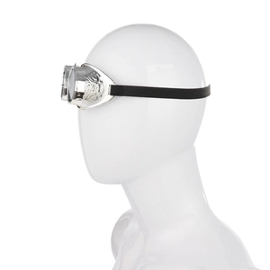 Macro detail of silver steampunk goggles with baroque floral engraving on the side frame