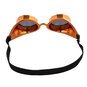 Detail of steampunk goggles with orange metallic frames, dark lenses and elastic headband