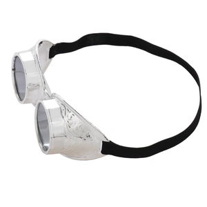 Macro view of silver steampunk goggles with embossed side patterns and smoke lenses