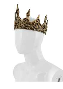 Detailed view of vintage gold crown with scroll patterns on a white mannequin head