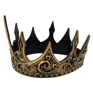 Detailed view of the vintage gold relief patterns on the medieval king crown headpiece