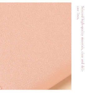 Detail of pink-orange lychee pattern leather with a high-quality matte finish