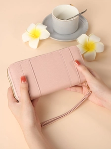 Long pink leather wallet with litchi texture and wrist strap for women