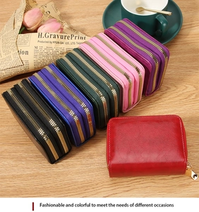 Close-up of vibrant RFID leather card wallets in six colors with dual gold zippers