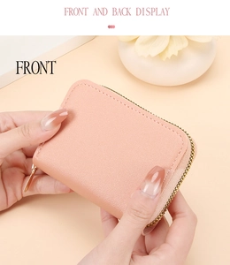 Detailed front view of a pink litchi grain PU leather card holder with gold zipper
