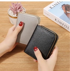 Dual-zipper leather card holders in grey and black with premium lychee grain texture