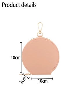 Dettaglio portamonete rotondo in pelle beige con cerniera e misura del diametro di 10 cm