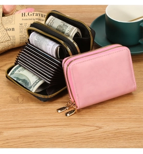 Macro detail of dual-zipper accordion wallet with RFID blocking and 11 card slots