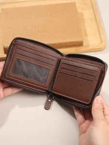 Classic men's dark brown leather wallet with four card slots and zip closure