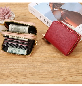 Close-up of double zipper card holder with RFID blocking and multiple card slots