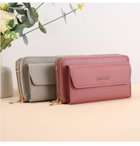 Dual zipper crossbody phone wallets in gray and pink faux leather with gold hardware