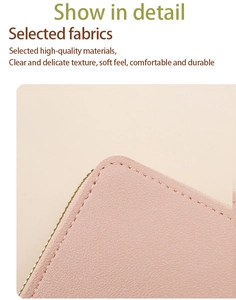 Dettaglio borsa porta cellulare rosa con cuciture precise e cerniera dorata lucida