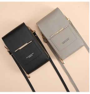 Detailed view of black and gray crossbody phone bags with gold trim and zippers