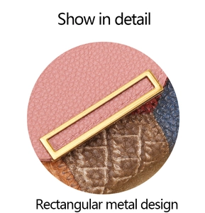 Detail of pink litchi leather and brown croc pattern stitching with rectangular gold buckle